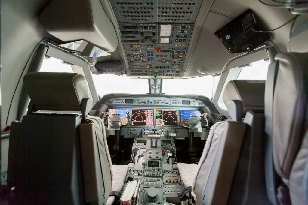 Aircraft cockpit interior with modern instrument panels